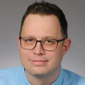 Dr. Martin Bartenberger